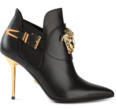 versace ladies boots.